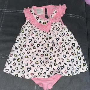 Shirt sleeved onesies. Sized 3-6 Months